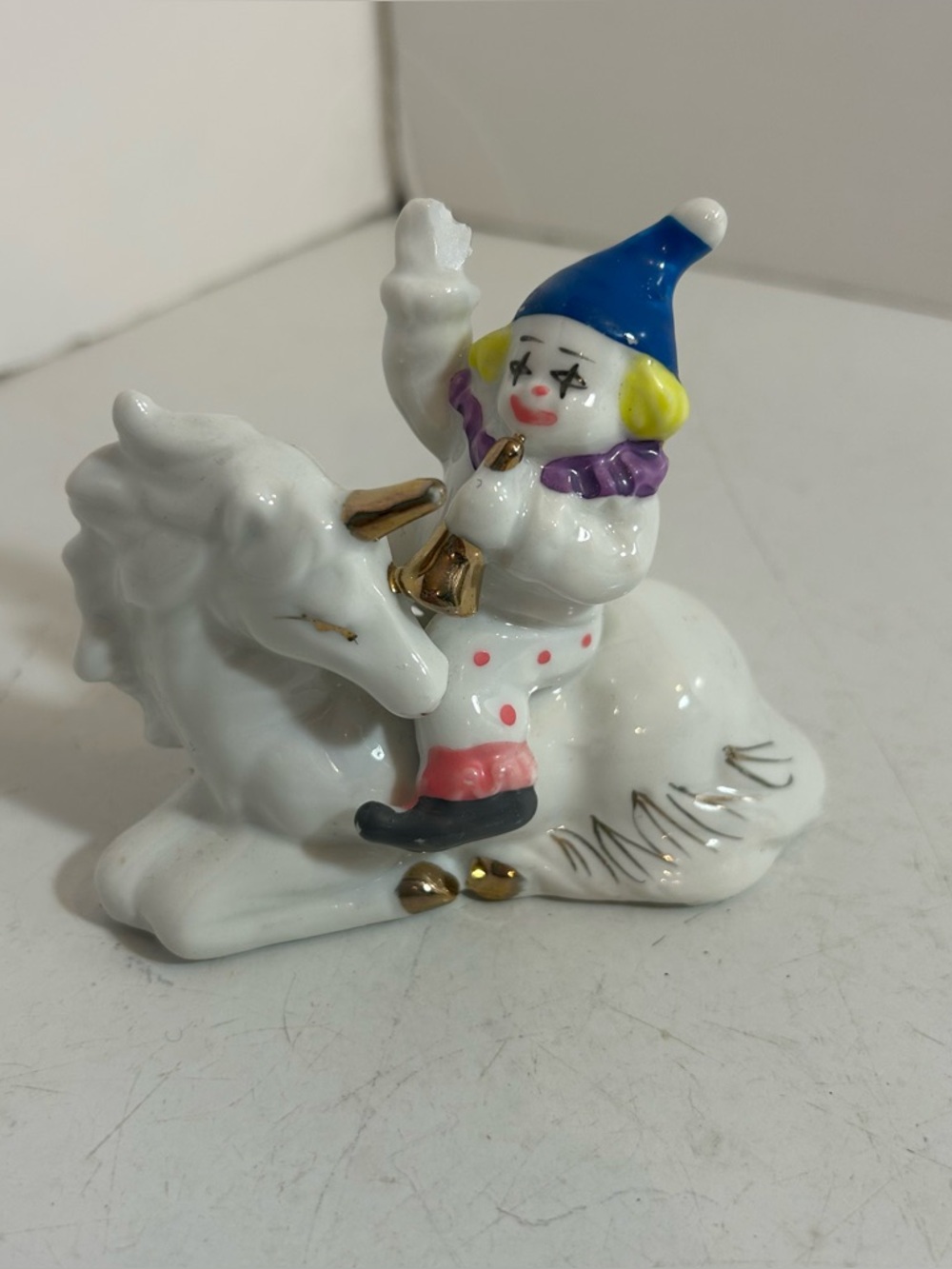 Vintage ceramic figurine‎ clown riding unicorn gold accents Knick knack